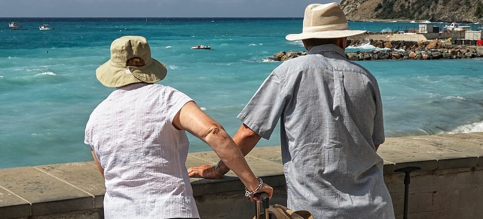 an elderly couple who know that you're never too old to travel